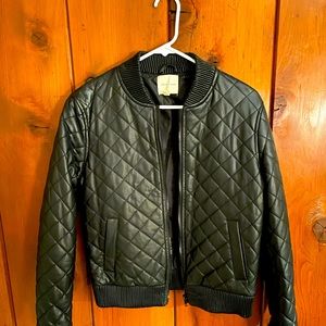 Selling black faux leather jacket, size medium.